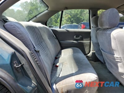 Zdjęcie 10 z 12 samochodu: 2001 CHEVROLET LUMINA VIN:2G1WL52J811225351 - miniatura