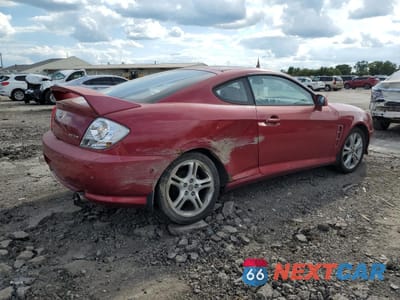 Trzecie zdjęcie samochodu z tyłu: 2005 HYUNDAI TIBURON GT VIN:KMHHN65F25U160235 - miniatura