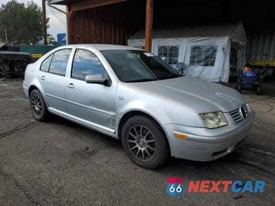 Czwarte zdjęcie samochodu z boku: 2001 VOLKSWAGEN JETTA GLS VIN:3VWSK69M81M214810 - miniatura