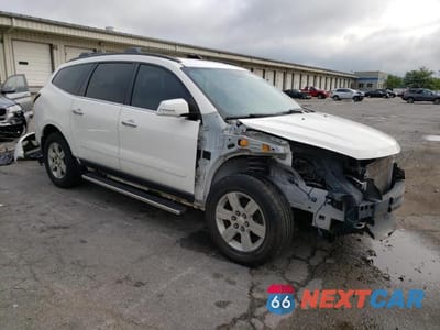 Czwarte zdjęcie samochodu z boku: 2014 CHEVROLET TRAVERSE LT VIN:1GNKVHKD2EJ362123 - miniatura