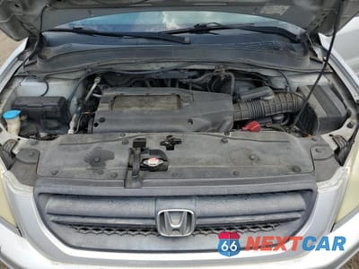 Zdjęcie 12 z 13 samochodu: 2004 HONDA PILOT EXL VIN:2HKYF18794H532770 - miniatura