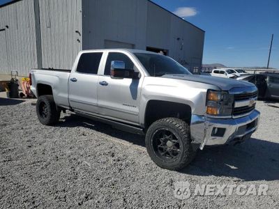 Czwarte zdjęcie samochodu z boku: 2016 CHEVROLET SILVERADO K2500 HEAVY DUTY LTZ VIN:1GC1KWE82GF189709 - miniatura