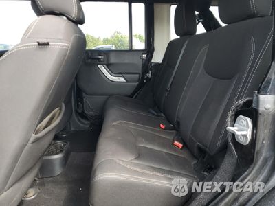 Zdjęcie 10 z 12 samochodu: 2014 JEEP WRANGLER UNLIMITED SAHARA VIN:1C4HJWEG4EL272890 - miniatura