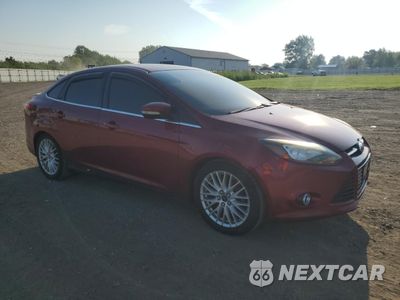 Czwarte zdjęcie samochodu z boku: 2014 FORD FOCUS TITANIUM VIN:1FADP3J22EL181712 - miniatura