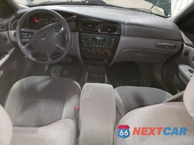 Zdjęcie 8 z 13 samochodu: 2000 FORD TAURUS SE VIN:1FAFP5828YG225641 - miniatura