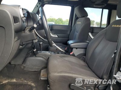 Zdjęcie 7 z 12 samochodu: 2014 JEEP WRANGLER UNLIMITED SAHARA VIN:1C4HJWEG4EL272890 - miniatura