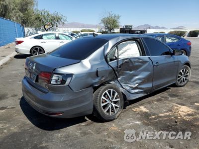 Trzecie zdjęcie samochodu z tyłu: 2017 VOLKSWAGEN JETTA SE VIN:3VWDB7AJ9HM310343 - miniatura