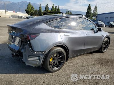 Trzecie zdjęcie samochodu z tyłu: 2023 TESLA MODEL Y VIN:7SAYGDEE7PA067247 - miniatura