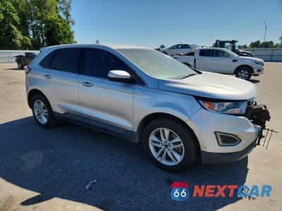 Czwarte zdjęcie samochodu z boku: 2015 FORD EDGE SEL VIN:2FMTK4J93FBB95252 - miniatura
