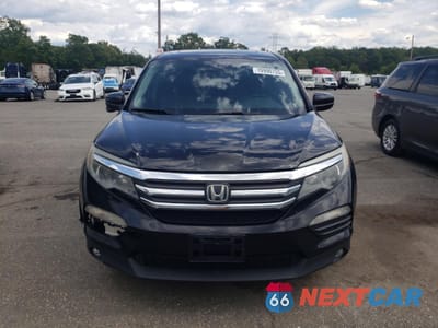 Piąte zdjęcie samochodu w środku: 2016 HONDA PILOT EXL VIN:5FNYF6H62GB090454 - miniatura