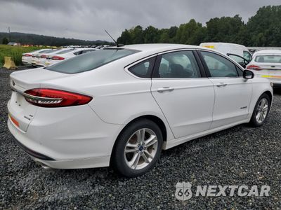 Trzecie zdjęcie samochodu z tyłu: 2018 FORD FUSION SE HYBRID VIN:3FA6P0LU6JR281880 - miniatura