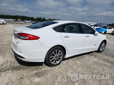 Trzecie zdjęcie samochodu z tyłu: 2017 FORD FUSION SE HYBRID VIN:3FA6P0LU1HR409503 - miniatura