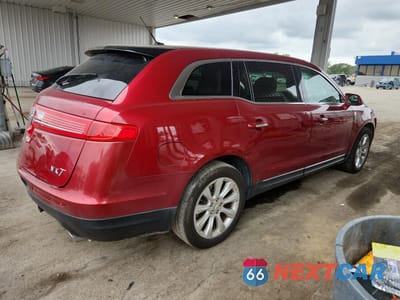 Trzecie zdjęcie samochodu z tyłu: 2013 LINCOLN MKT VIN:2LMHJ5FK4DBL50080 - miniatura