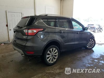 Trzecie zdjęcie samochodu z tyłu: 2017 FORD ESCAPE TITANIUM VIN:1FMCU0J98HUD34176 - miniatura