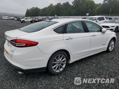Trzecie zdjęcie samochodu z tyłu: 2017 FORD FUSION SE HYBRID VIN:3FA6P0LU5HR410086 - miniatura