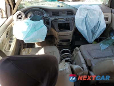 Zdjęcie 8 z 13 samochodu: 2002 HONDA ODYSSEY EXL VIN:2HKRL18082H579172 - miniatura
