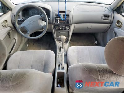 Zdjęcie 8 z 12 samochodu: 2001 TOYOTA COROLLA CE VIN:1NXBR12E01Z506561 - miniatura