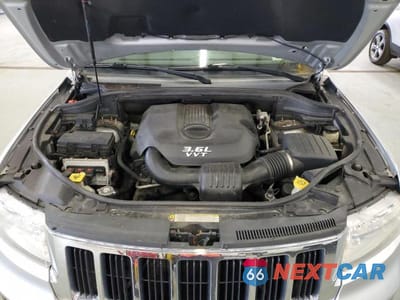 Zdjęcie 12 z 13 samochodu: 2012 JEEP GRAND CHEROKEE LAREDO VIN:1C4RJFAG2CC166493 - miniatura