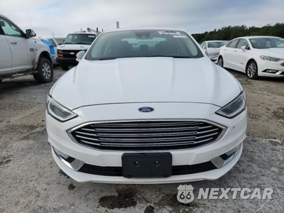 Piąte zdjęcie samochodu w środku: 2017 FORD FUSION SE HYBRID VIN:3FA6P0LU6HR409240 - miniatura