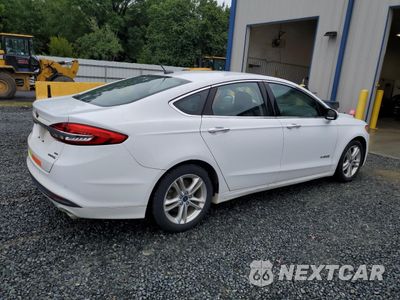 Trzecie zdjęcie samochodu z tyłu: 2018 FORD FUSION SE HYBRID VIN:3FA6P0LU4JR171796 - miniatura