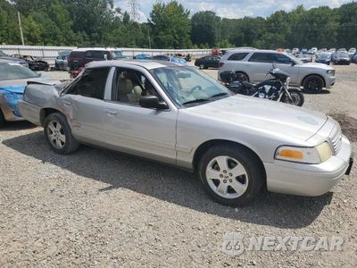 Czwarte zdjęcie samochodu z boku: 2007 FORD CROWN VICTORIA VIN:2FDHP74W07X116857 - miniatura
