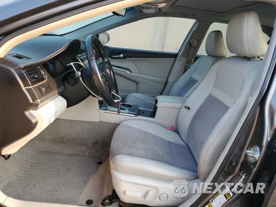 Zdjęcie 7 z 14 samochodu: 2012 TOYOTA CAMRY HYBRID VIN:4T1BD1FKXCU021765 - miniatura