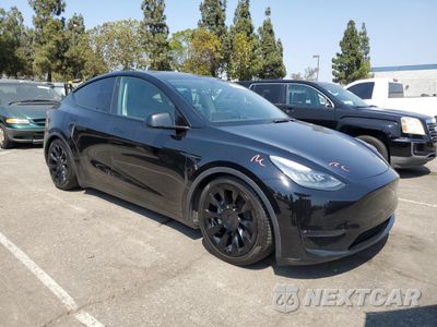 Czwarte zdjęcie samochodu z boku: 2021 TESLA MODEL Y VIN:5YJYGDEEXMF160274 - miniatura