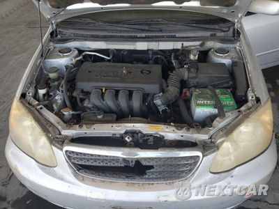 Zdjęcie 11 z 12 samochodu: 2005 TOYOTA COROLLA CE VIN:JTDBR32E052062499 - miniatura
