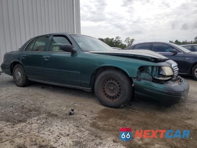 Czwarte zdjęcie samochodu z boku: 2000 FORD CROWN VICTORIA POLICE INTERCEPTOR VIN:2FAFP71W1YX163972 - miniatura