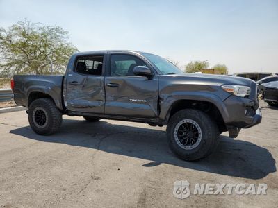Czwarte zdjęcie samochodu z boku: 2018 TOYOTA TACOMA DOUBLE CAB VIN:3TMCZ5AN0JM160288 - miniatura