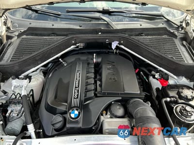 Zdjęcie 7 z 10 samochodu: 2013 BMW X5 XDRIVE35I VIN:5UXZV4C50D0B01442 - miniatura