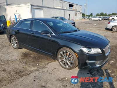 Czwarte zdjęcie samochodu z boku: 2018 LINCOLN MKZ PREMIERE VIN:3LN6L5A96JR601471 - miniatura