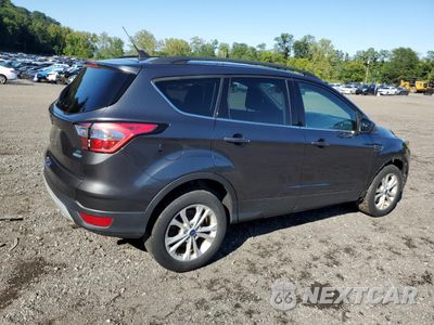Trzecie zdjęcie samochodu z tyłu: 2018 FORD ESCAPE SE VIN:1FMCU9GD2JUD33157 - miniatura