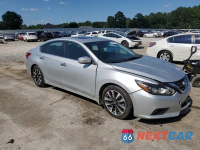 Czwarte zdjęcie samochodu z boku: 2016 NISSAN ALTIMA 2.5 VIN:1N4AL3AP9GC291511 - miniatura