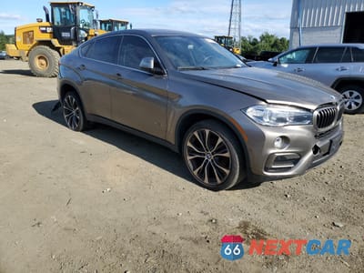 Czwarte zdjęcie samochodu z boku: 2017 BMW X6 35I XDRIVE VIN:5UXKU2C33H0U28914 - miniatura