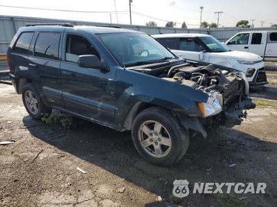 Czwarte zdjęcie samochodu z boku: 2024 JEEP GRAND CHEROKEE LAREDO VIN:1J4HR48N65C624997 - miniatura