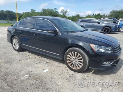 Czwarte zdjęcie samochodu z boku: 2016 VOLKSWAGEN PASSAT SE VIN:1VWBS7A37GC059041 - miniatura