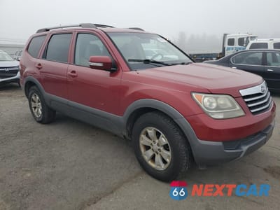 Czwarte zdjęcie samochodu z boku: 2009 KIA BORREGO LX VIN:KNDJJ741095016910 - miniatura