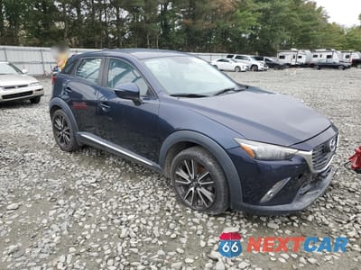 Czwarte zdjęcie samochodu z boku: 2016 MAZDA CX-3 GRAND TOURING VIN:JM1DKBD78G0113896 - miniatura