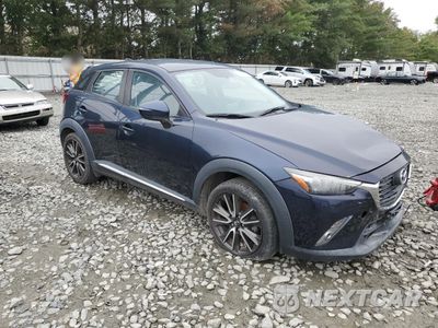 Czwarte zdjęcie samochodu z boku: 2016 MAZDA CX-3 GRAND TOURING VIN:JM1DKBD78G0113896 - miniatura