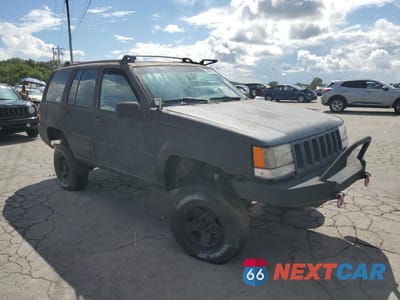 Czwarte zdjęcie samochodu z boku: 1997 JEEP GRAND CHEROKEE LAREDO VIN:1J4GZ58S9VC541295 - miniatura