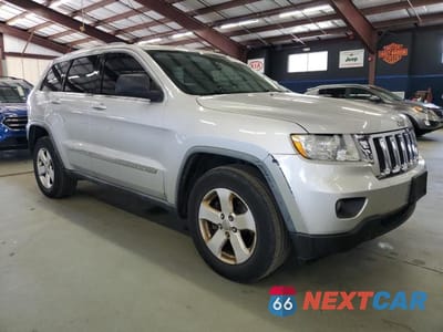Czwarte zdjęcie samochodu z boku: 2012 JEEP GRAND CHEROKEE LAREDO VIN:1C4RJFAG2CC166493 - miniatura