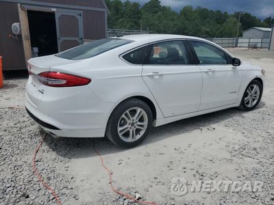 Trzecie zdjęcie samochodu z tyłu: 2018 FORD FUSION SE HYBRID VIN:3FA6P0LU3JR281917 - miniatura