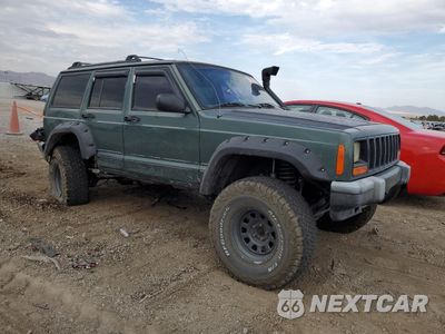 Czwarte zdjęcie samochodu z boku: 2000 JEEP CHEROKEE SPORT VIN:1J4FF48S7YL238695 - miniatura