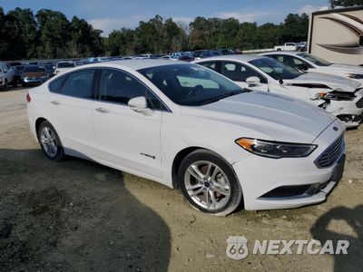 Czwarte zdjęcie samochodu z boku: 2018 FORD FUSION SE HYBRID VIN:3FA6P0LU8JR171736 - miniatura