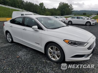 Czwarte zdjęcie samochodu z boku: 2018 FORD FUSION SE HYBRID VIN:3FA6P0LU1JR171917 - miniatura