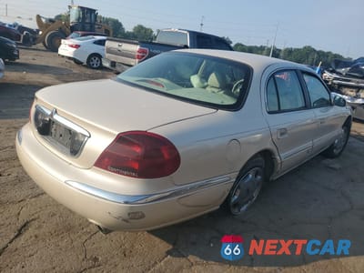 Trzecie zdjęcie samochodu z tyłu: 2002 LINCOLN CONTINENTAL VIN:1LNHM97V42Y619021 - miniatura