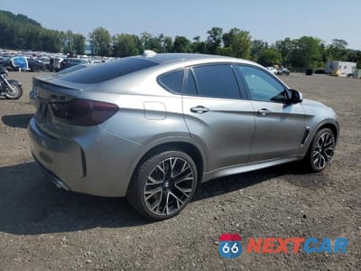 Trzecie zdjęcie samochodu z tyłu: 2017 BMW X6 M VIN:5YMKW8C58H0U71734 - miniatura