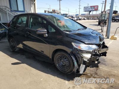 Czwarte zdjęcie samochodu z boku: 2018 HONDA FIT LX VIN:3HGGK5H4XJM735355 - miniatura