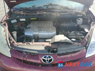 Zdjęcie 12 z 13 samochodu: 2010 TOYOTA SIENNA XLE VIN:5TDDK4CC1AS030664 - miniatura